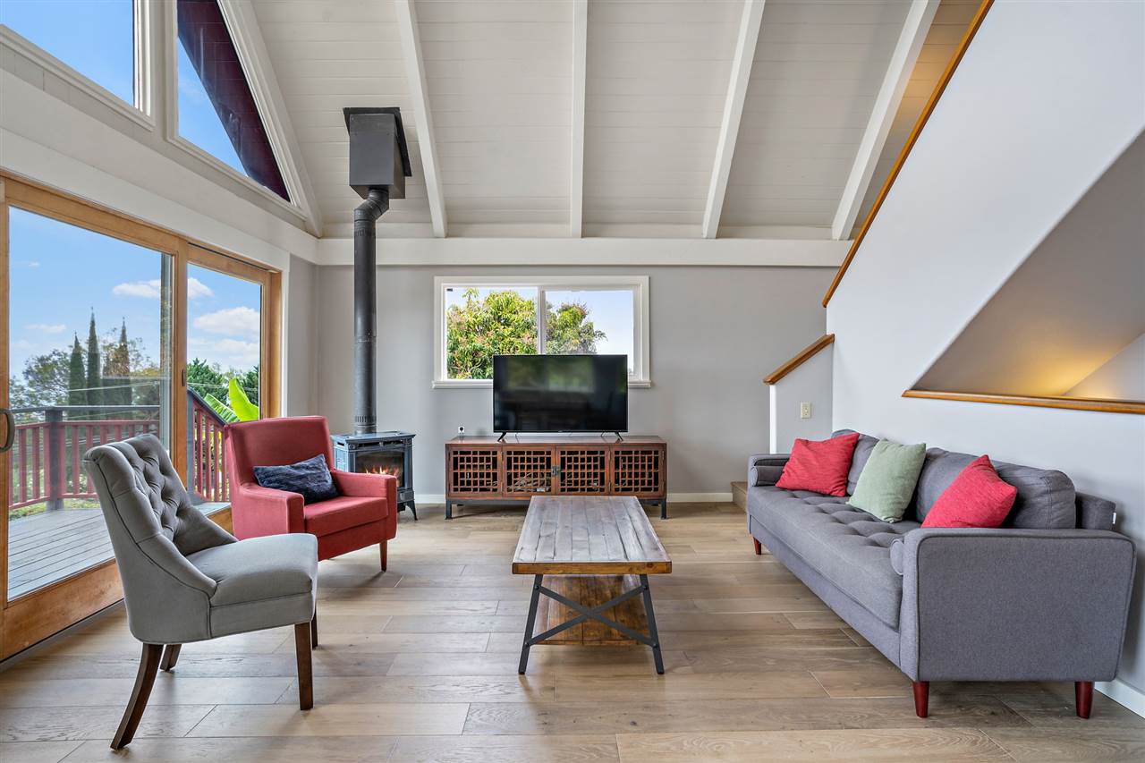 3655 Lower Kula Road Kula, HI 96790 - Photo 6 of 30 a living room with furniture and a flat screen tv