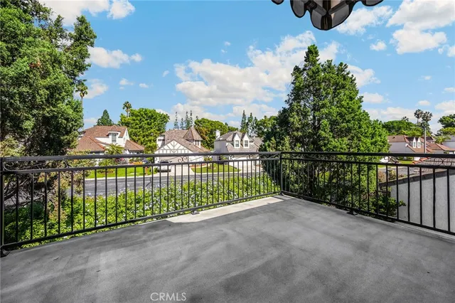 a view of a wrought iron fences in front of house