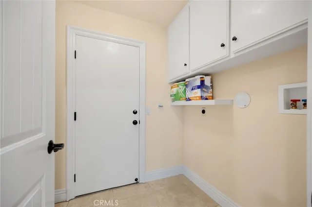 a view of a room with porch and wooden floor