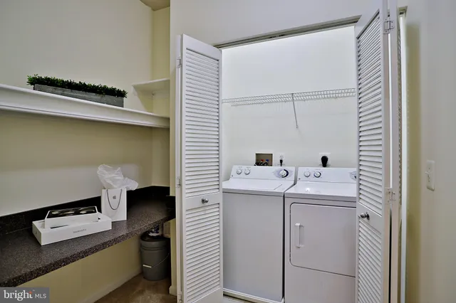 a view of a building with potted plants