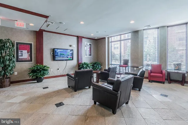 a workspace with furniture and window