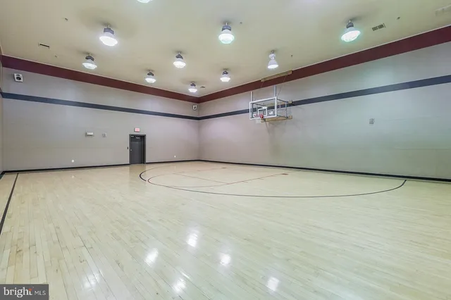 a room with furniture and pool table