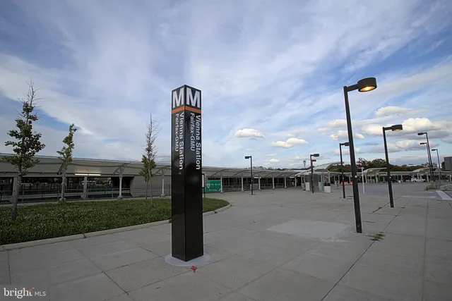 a view of a swimming pool with a lounge chair