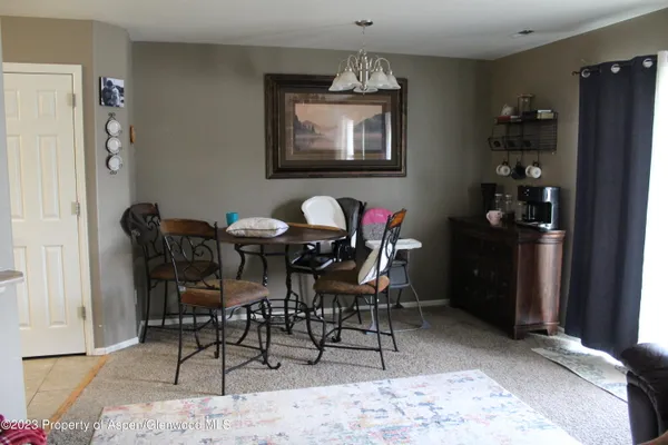 a view of a dining room with furniture