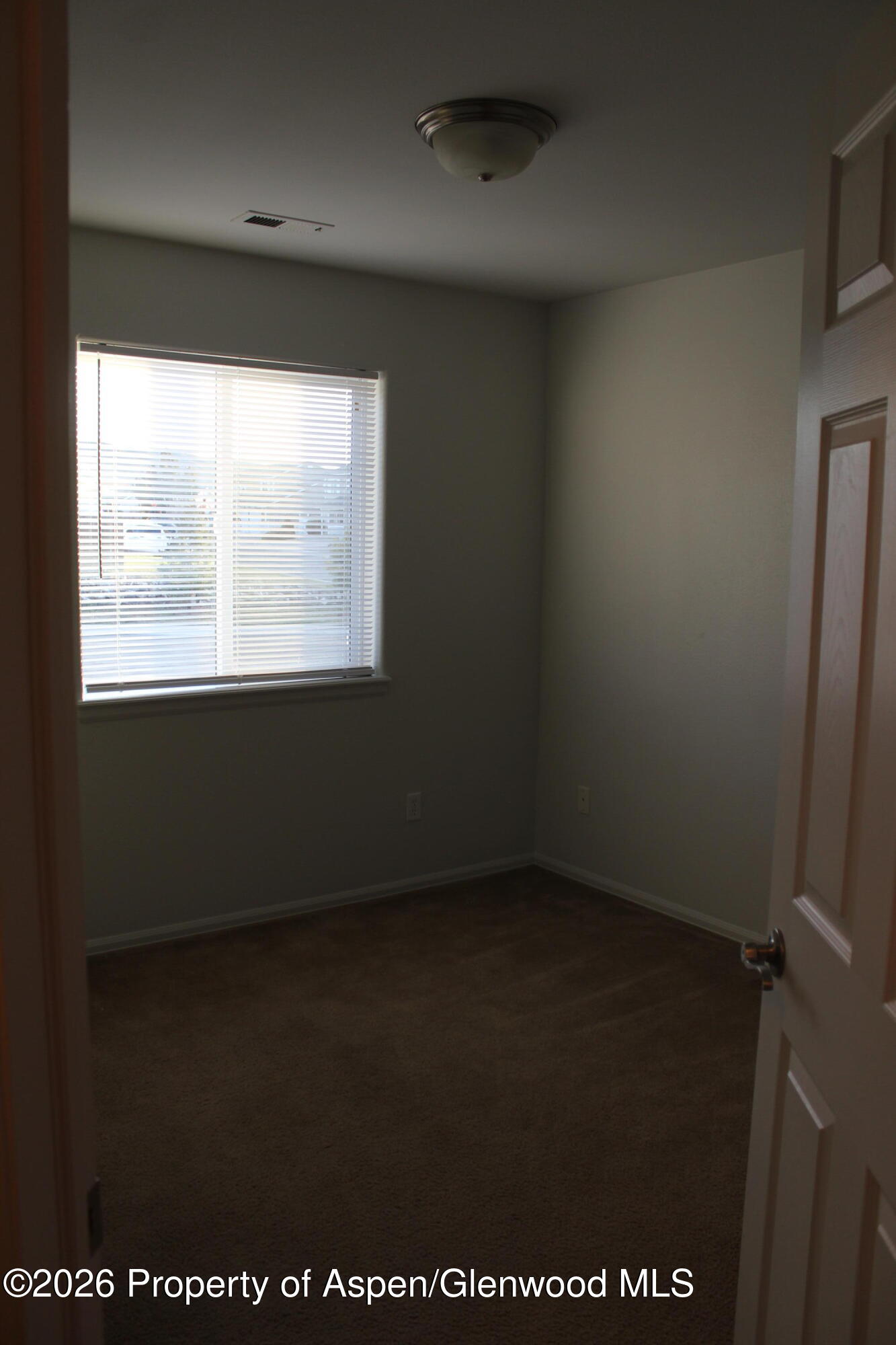 21 Bryan Loop Parachute, CO 81635 - Photo 7 of 8 an empty room with a window
