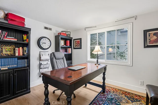 a view of a livingroom with furniture and window