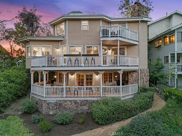 front view of a house with a small yard