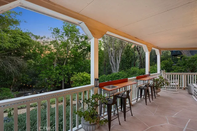 a view of a two chair in the balcony