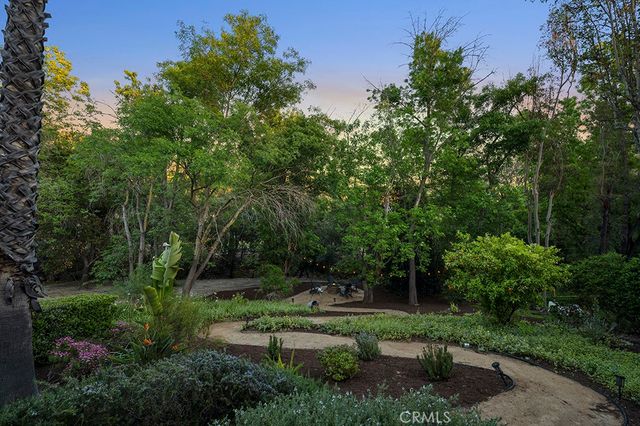 a view of backyard with green space