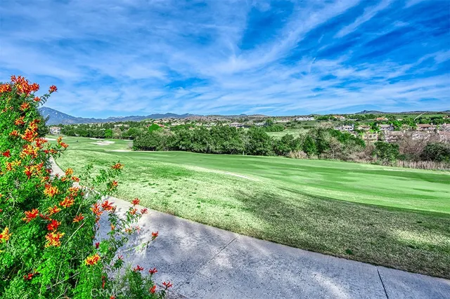 a view of a golf course with a lake