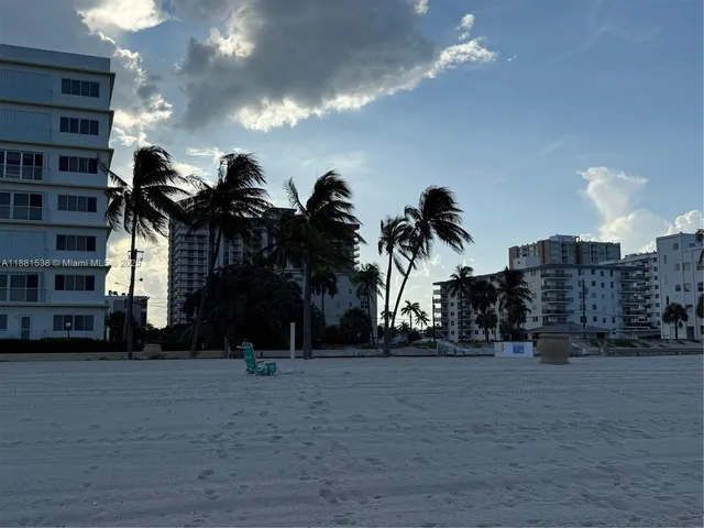 a bathroom with a sink a mirror and shower