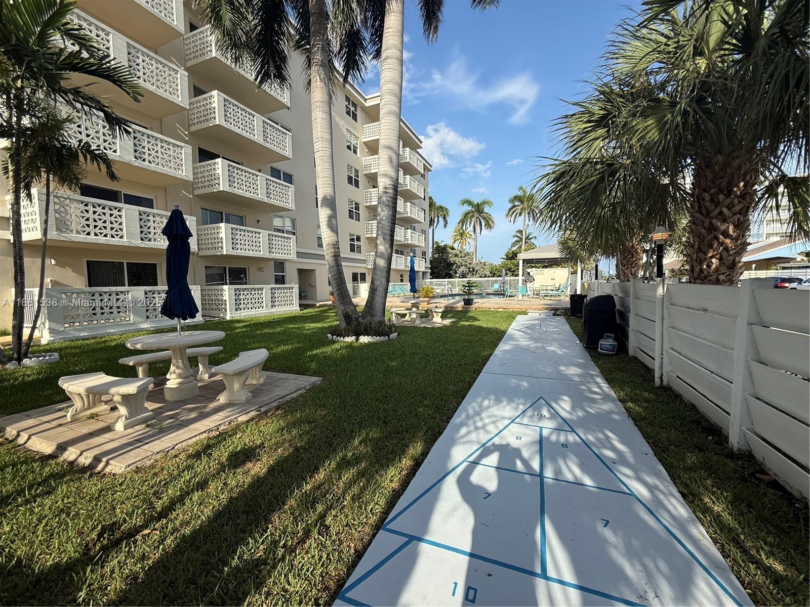 1901 South Ocean Drive, Unit 303 Hollywood, FL 33019 - Photo 26 of 29 a view of a street with houses on the side