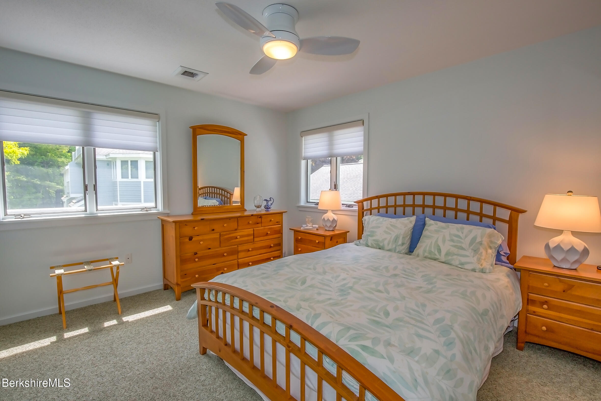 770 Summer Street, Unit 5D Lee, MA 01240 - Photo 13 of 45 a bedroom with a bed and a dresser next to a window