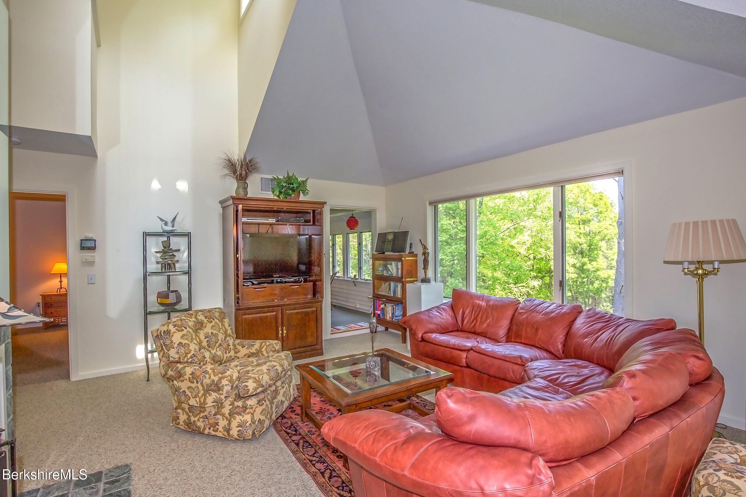770 Summer Street, Unit 5D Lee, MA 01240 - Photo 24 of 45 a living room with furniture and a large window