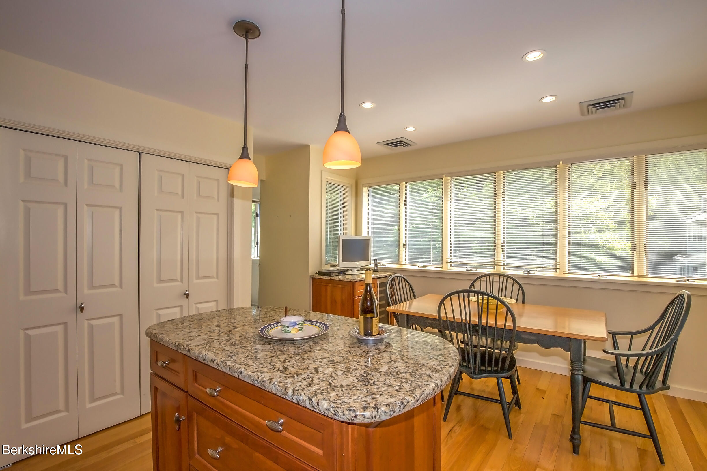 770 Summer Street, Unit 5D Lee, MA 01240 - Photo 27 of 45 a dining table tennis table and chairs