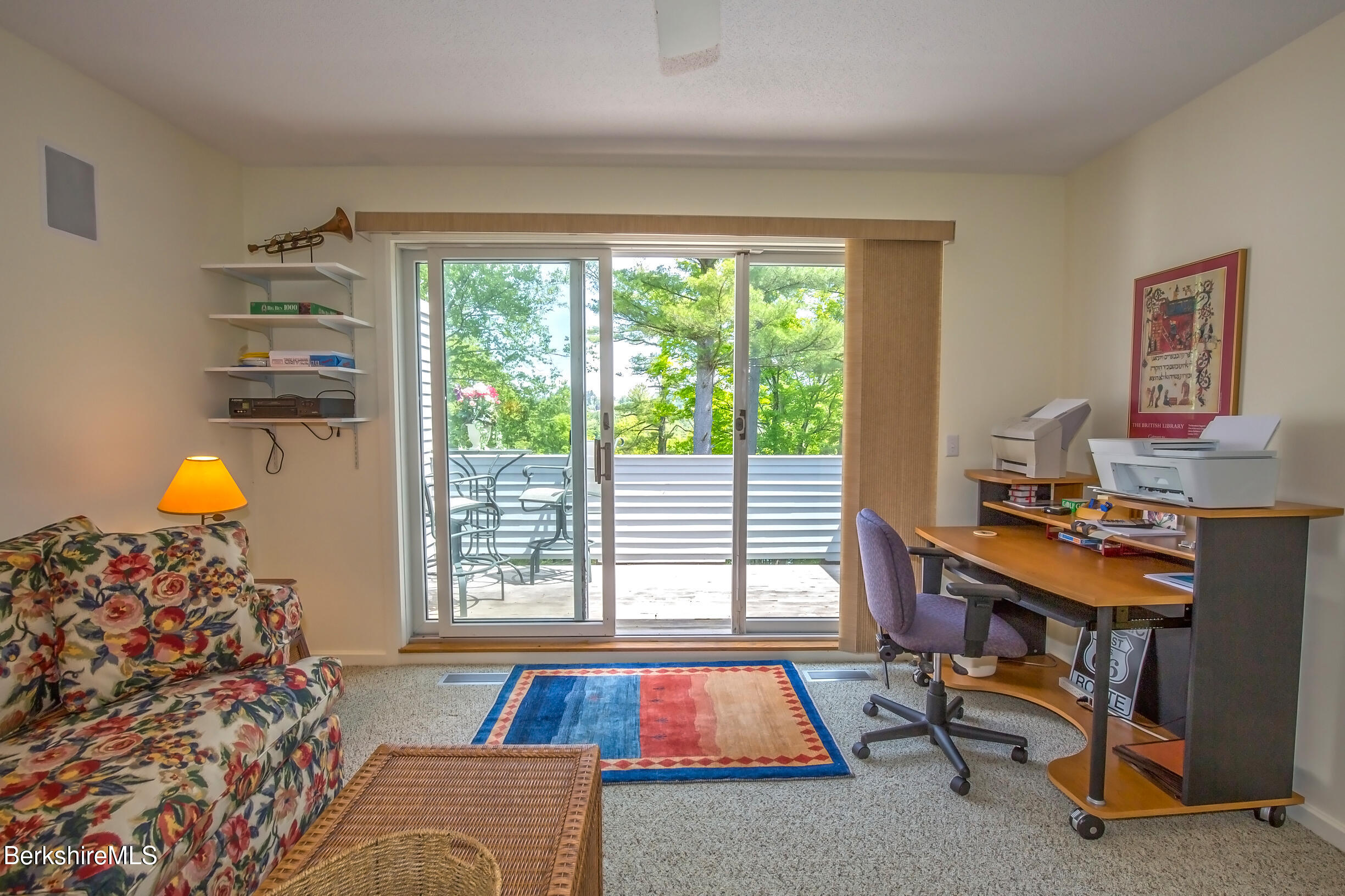 770 Summer Street, Unit 5D Lee, MA 01240 - Photo 34 of 45 a living room with furniture and a window