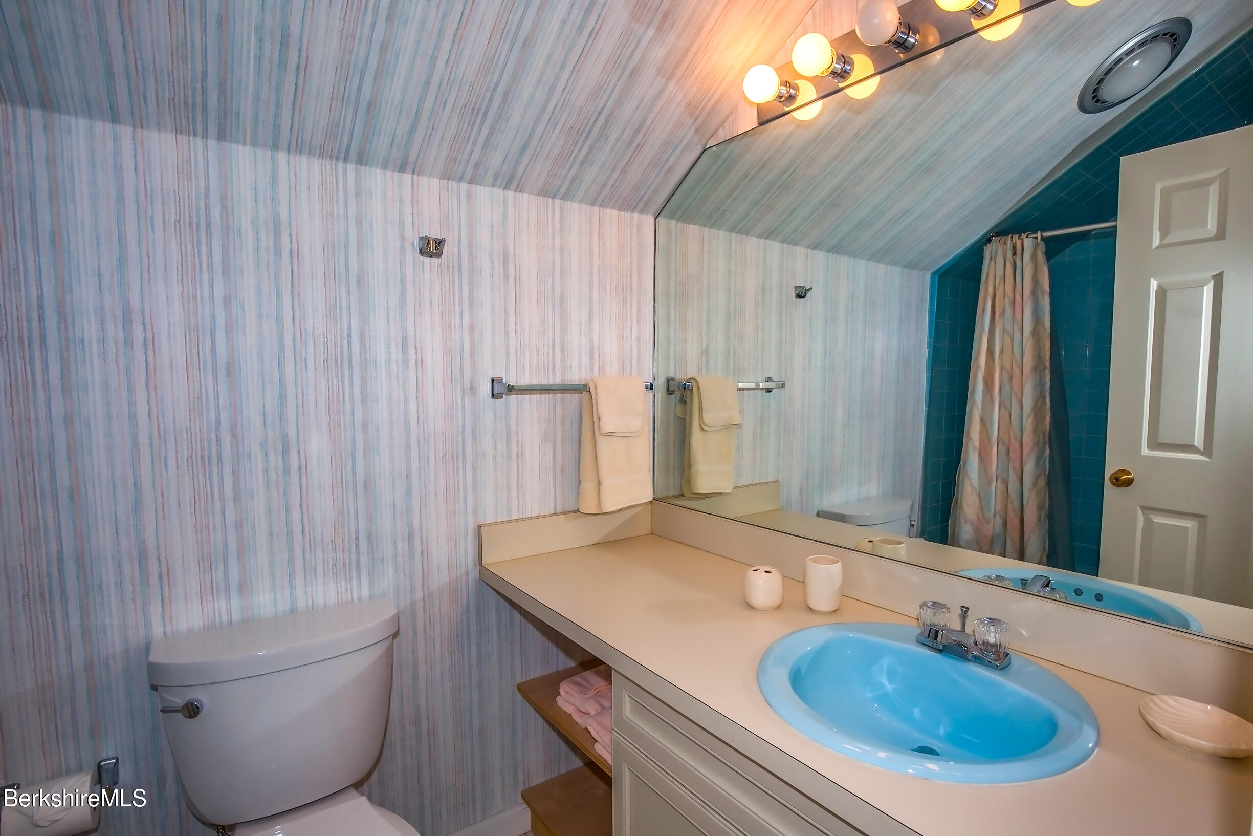 770 Summer Street, Unit 5D Lee, MA 01240 - Photo 35 of 45 a bathroom with a granite countertop sink and a mirror