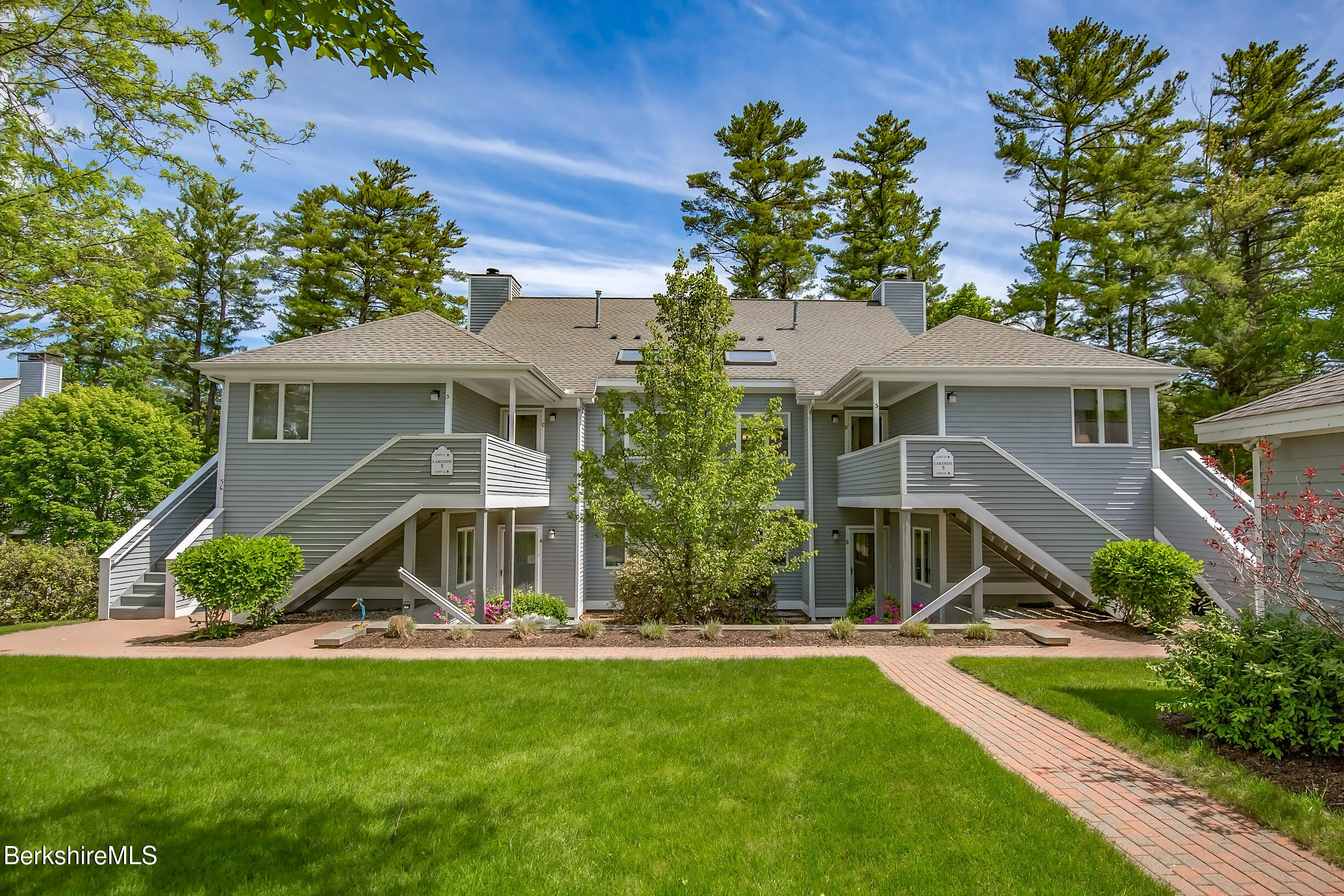 770 Summer Street, Unit 5D Lee, MA 01240 - Photo 39 of 45 a view of a house with a yard