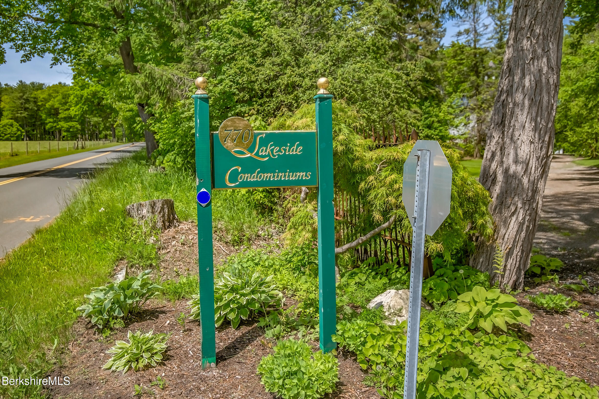 770 Summer Street, Unit 5D Lee, MA 01240 - Photo 41 of 45 a view of a sign in a garden