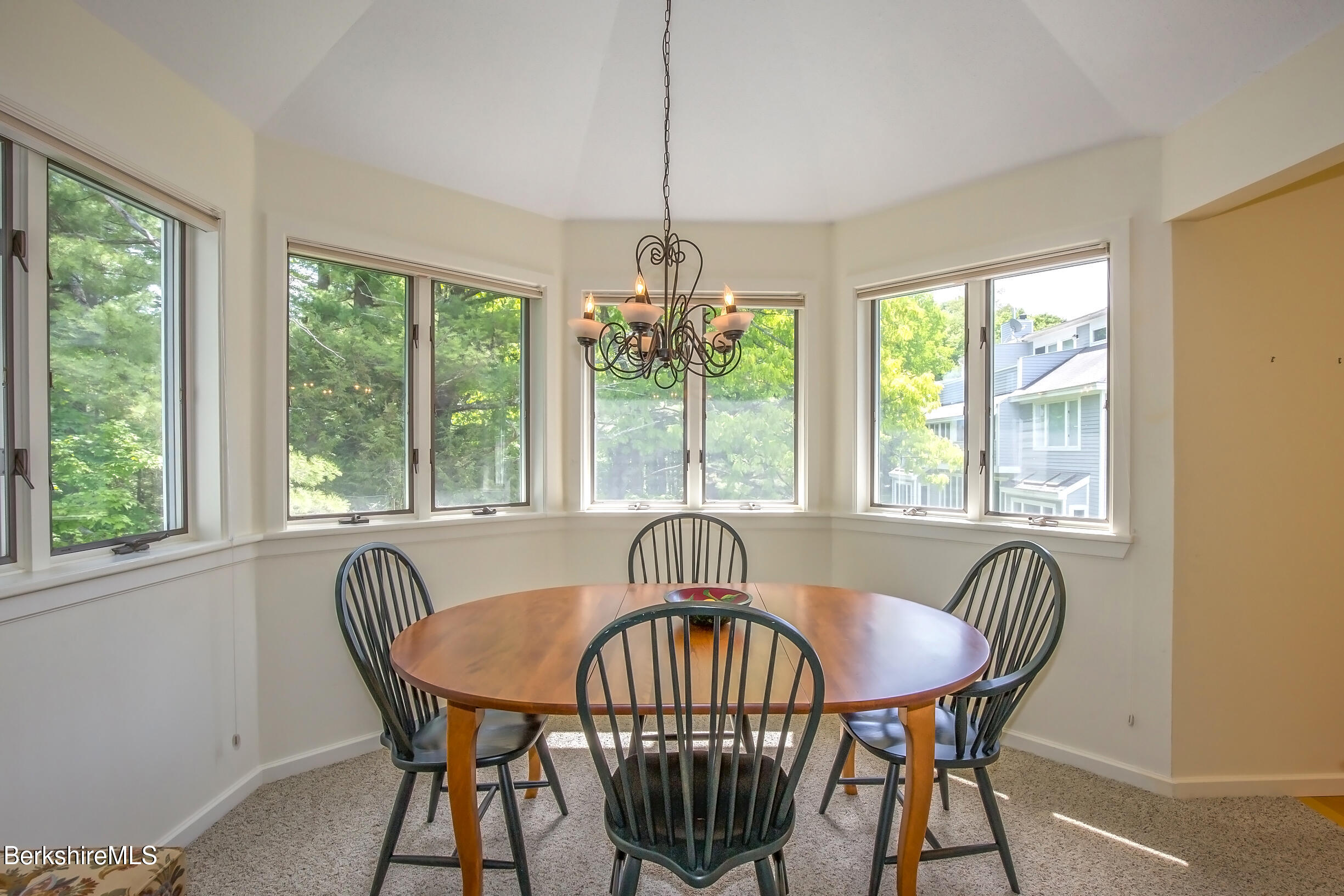 770 Summer Street, Unit 5D Lee, MA 01240 - Photo 9 of 45 a view of a dining room with furniture window and outside view