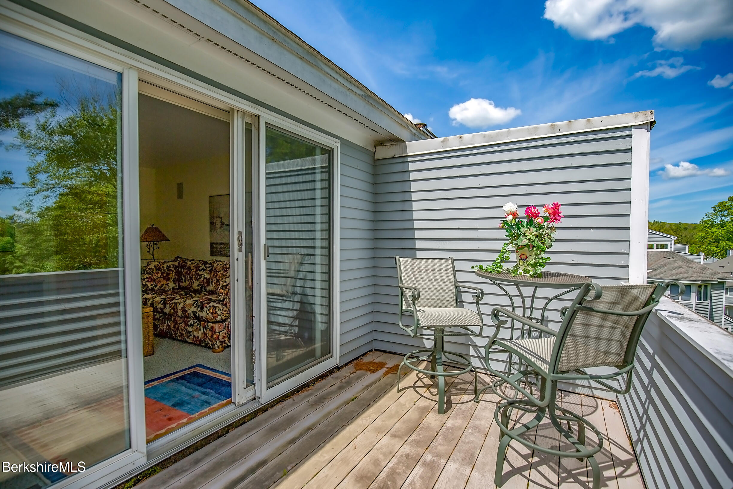 770 Summer Street, Unit 5D Lee, MA 01240 - Photo 10 of 45 a view of a balcony with dining area