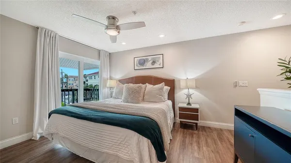 an aerial view of a house with garden space and street view