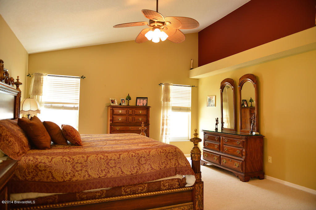 1706 Rustic Way Melbourne, FL 32935 - Photo 11 of 16 vaulted master ceiling