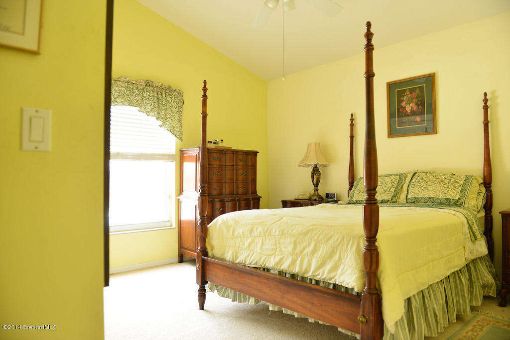 1706 Rustic Way Melbourne, FL 32935 - Photo 14 of 16 Third bedroom vaulted ceiling