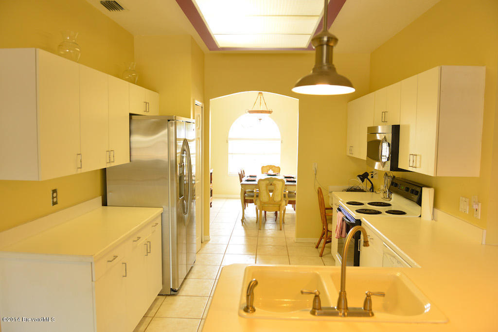 1706 Rustic Way Melbourne, FL 32935 - Photo 16 of 16 Walk through kitchen