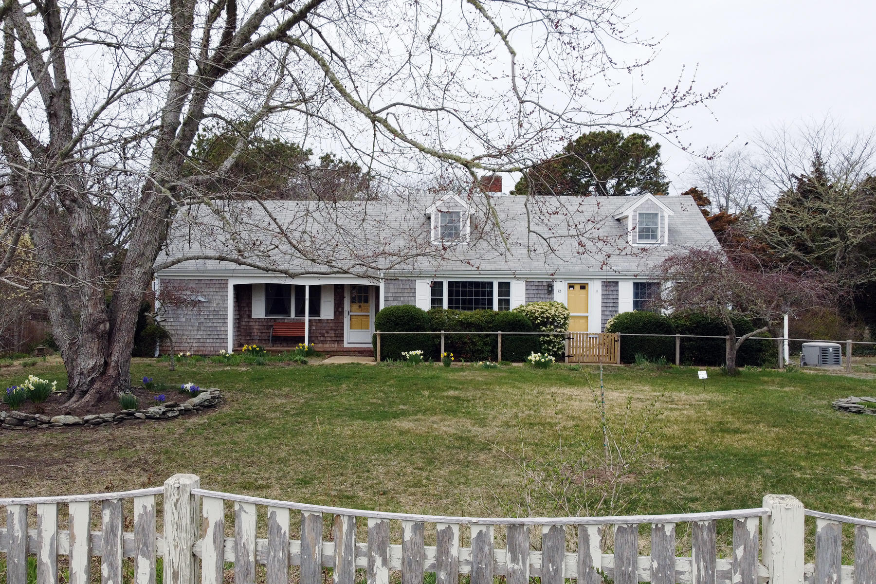 75 Lawton Road Eastham, MA 02642 - Photo 1 of 27 a view of a house with a yard