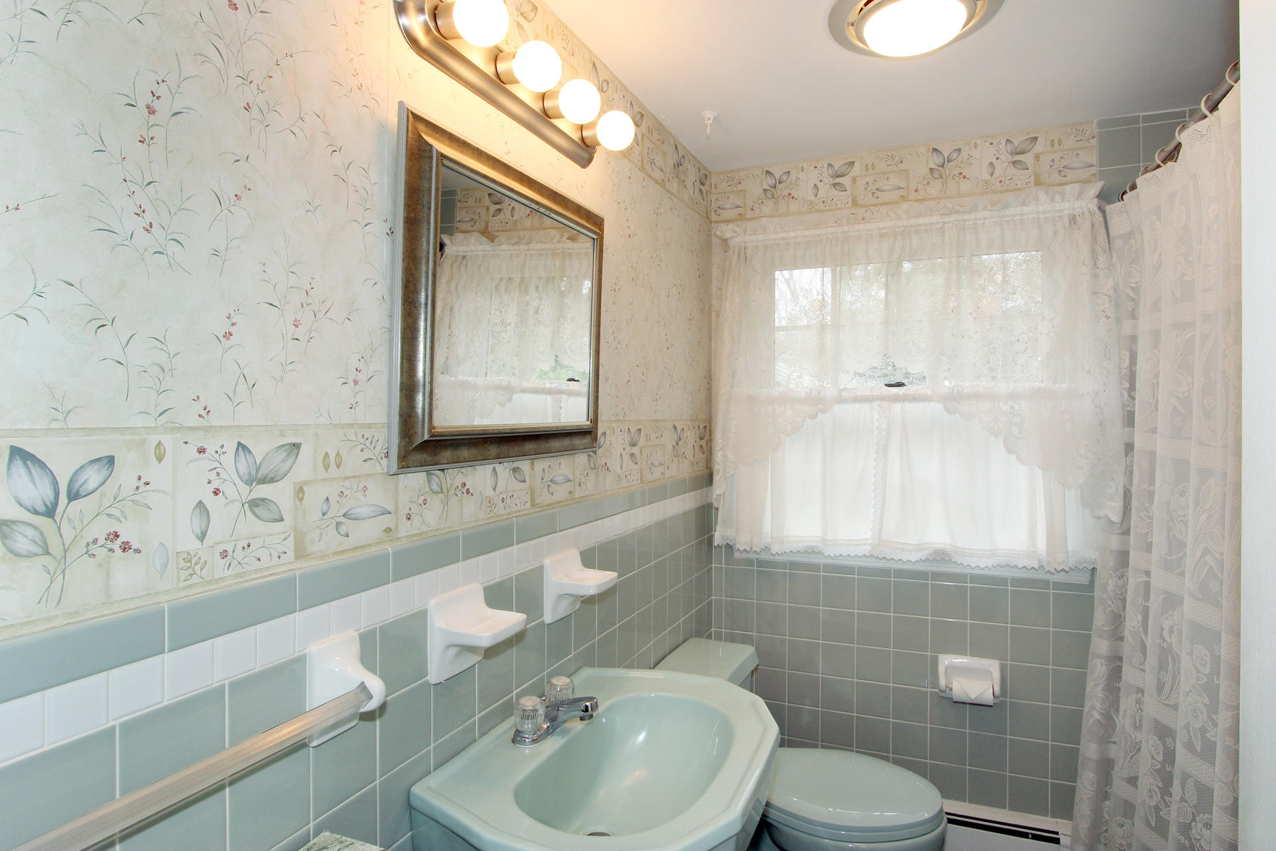 75 Lawton Road Eastham, MA 02642 - Photo 15 of 27 a bathroom with a sink a toilet and shower