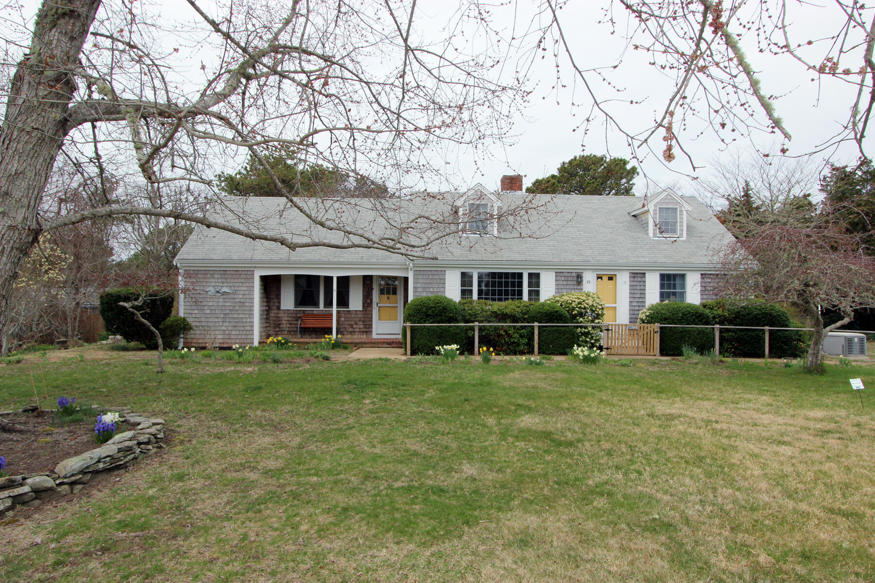75 Lawton Road Eastham, MA 02642 - Photo 23 of 27 front view of a house with a yard