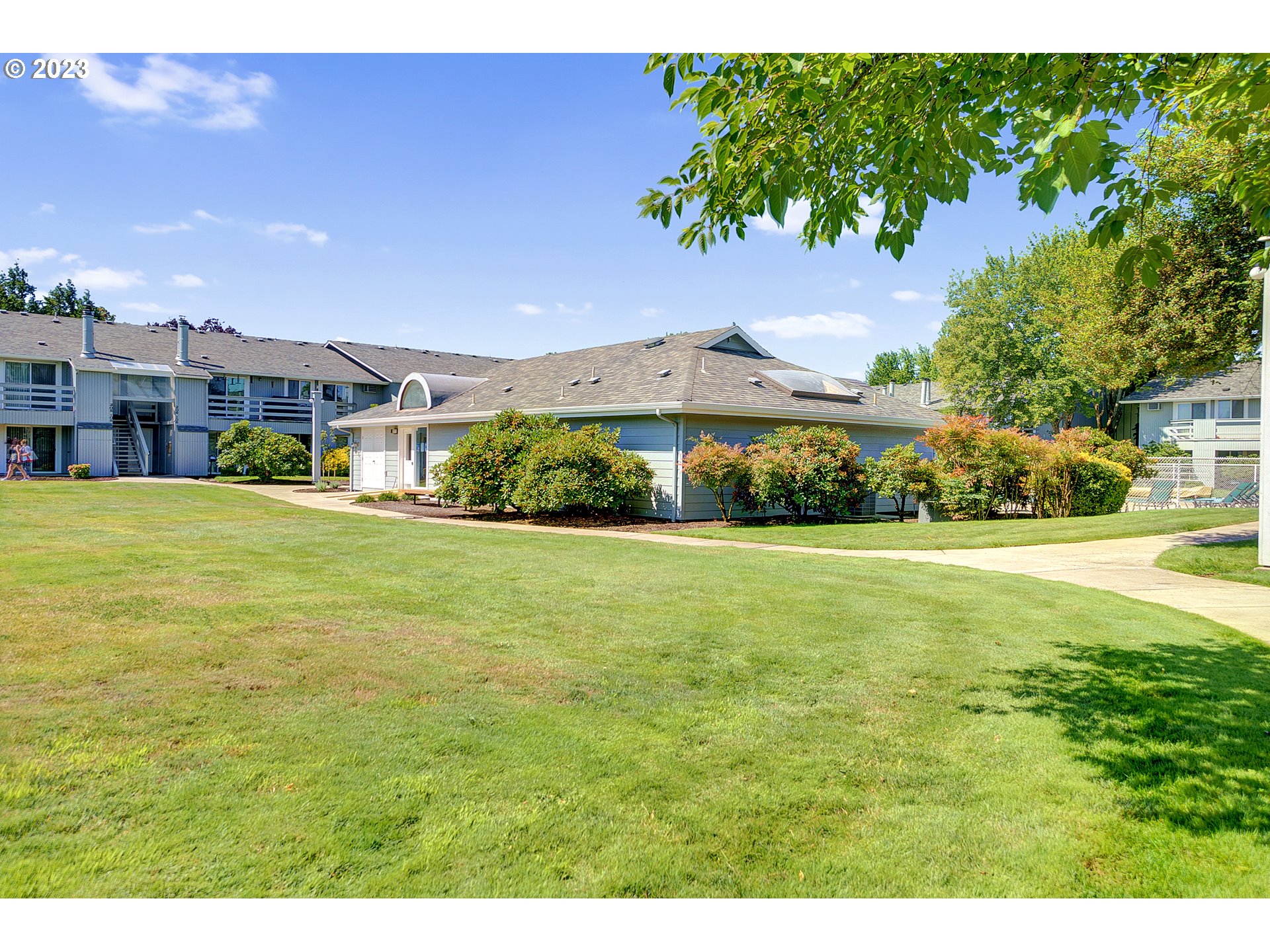650 Harlow Road, Unit 132 Springfield, OR 97477 - Photo 31 of 36 a view of a house with a yard