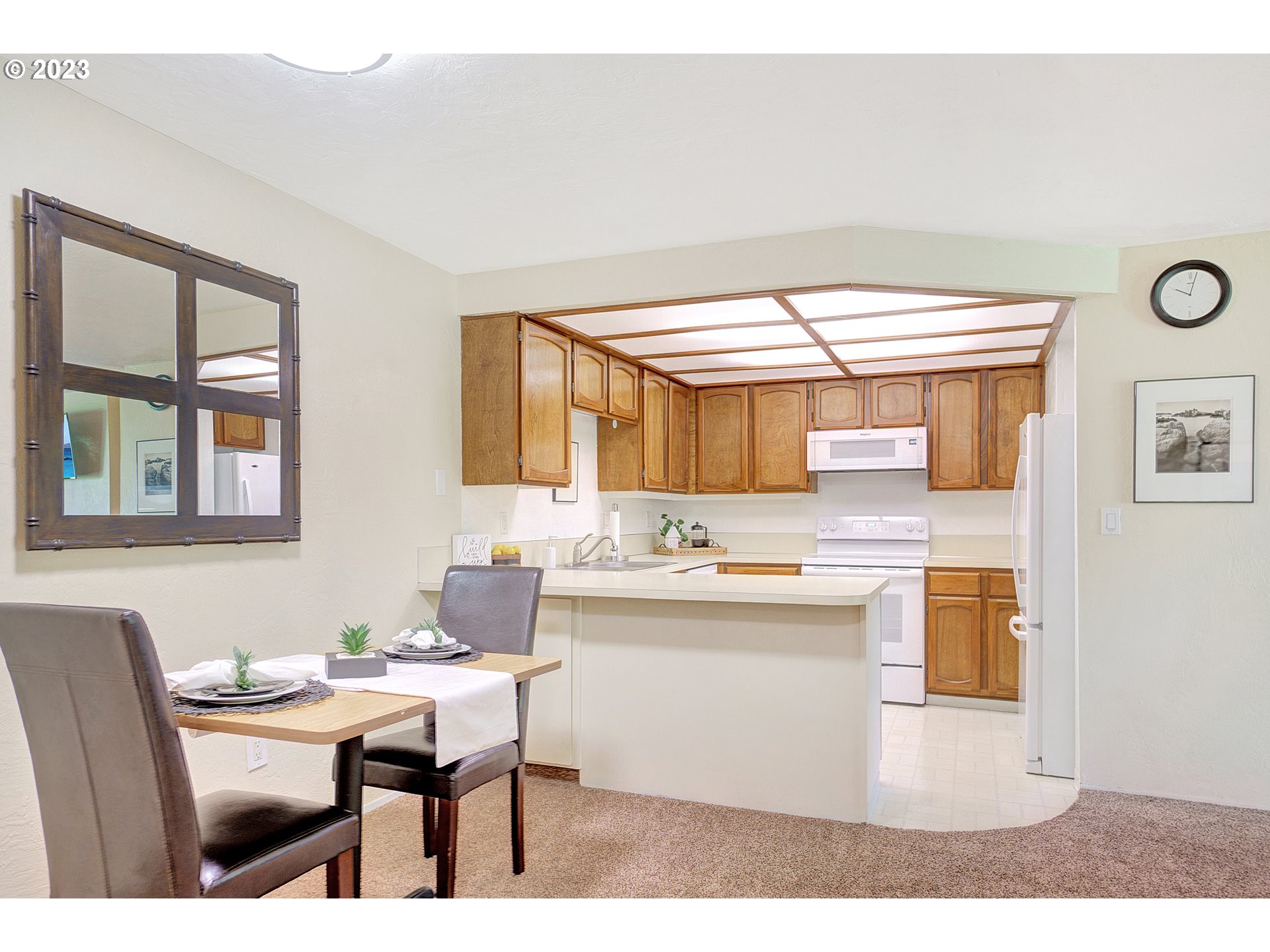 650 Harlow Road, Unit 132 Springfield, OR 97477 - Photo 9 of 36 a kitchen with a sink and a stove top oven