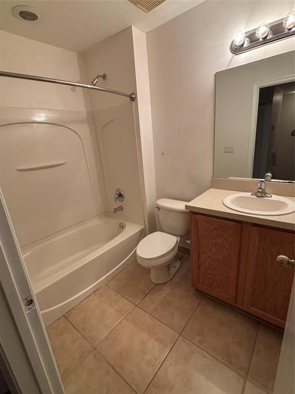 4632 Danson Way Delray Beach, FL 33445 - Photo 18 of 26 a bathroom with a sink a toilet and shower
