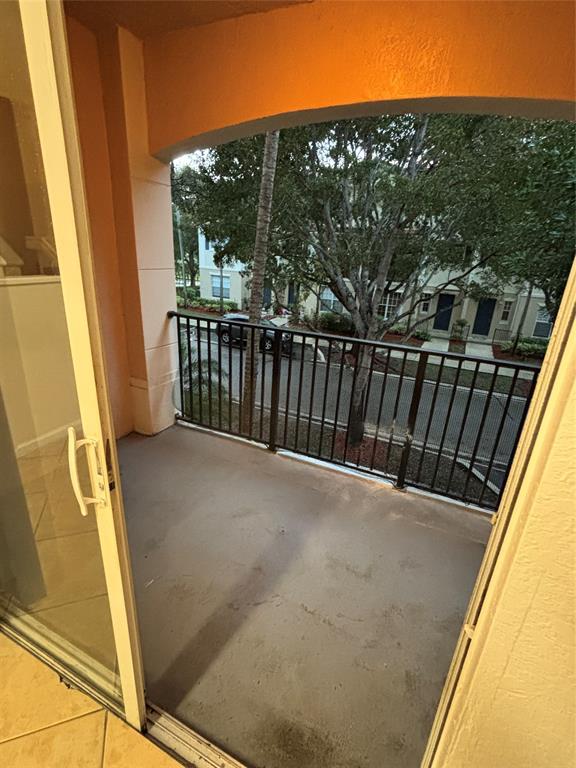 4632 Danson Way Delray Beach, FL 33445 - Photo 8 of 26 a view of balcony with wooden floor and fence