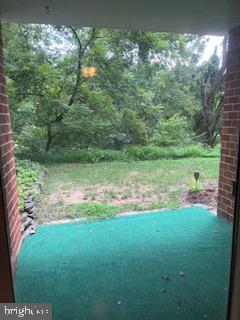 100 Castletown Road, Unit 101 Lutherville-Timonium, MD 21093 - Photo 17 of 18 a view of yard with green space