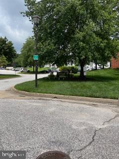 100 Castletown Road, Unit 101 Lutherville-Timonium, MD 21093 - Photo 18 of 18 a park with lots of trees and plants