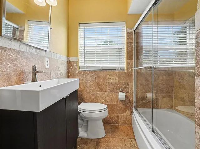 a bathroom with a sink and a bathtub