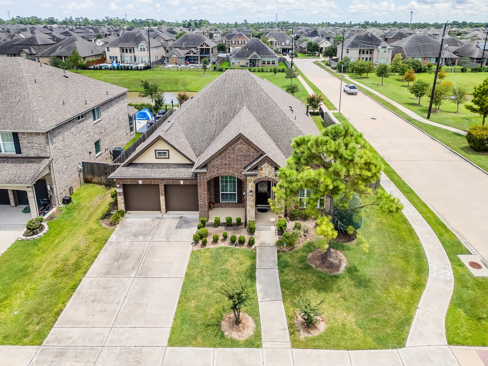 an aerial view of a house with a garden