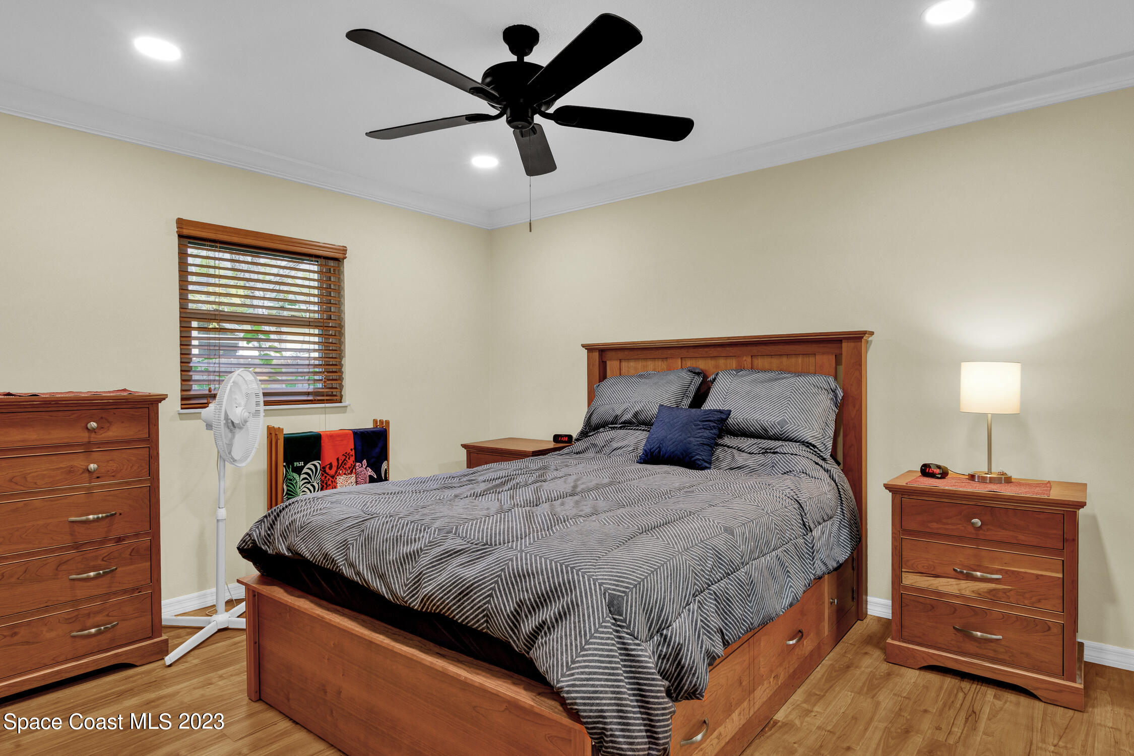 461 Easy Street Sebastian, FL 32958 - Photo 16 of 31 a bedroom with a bed and a closet