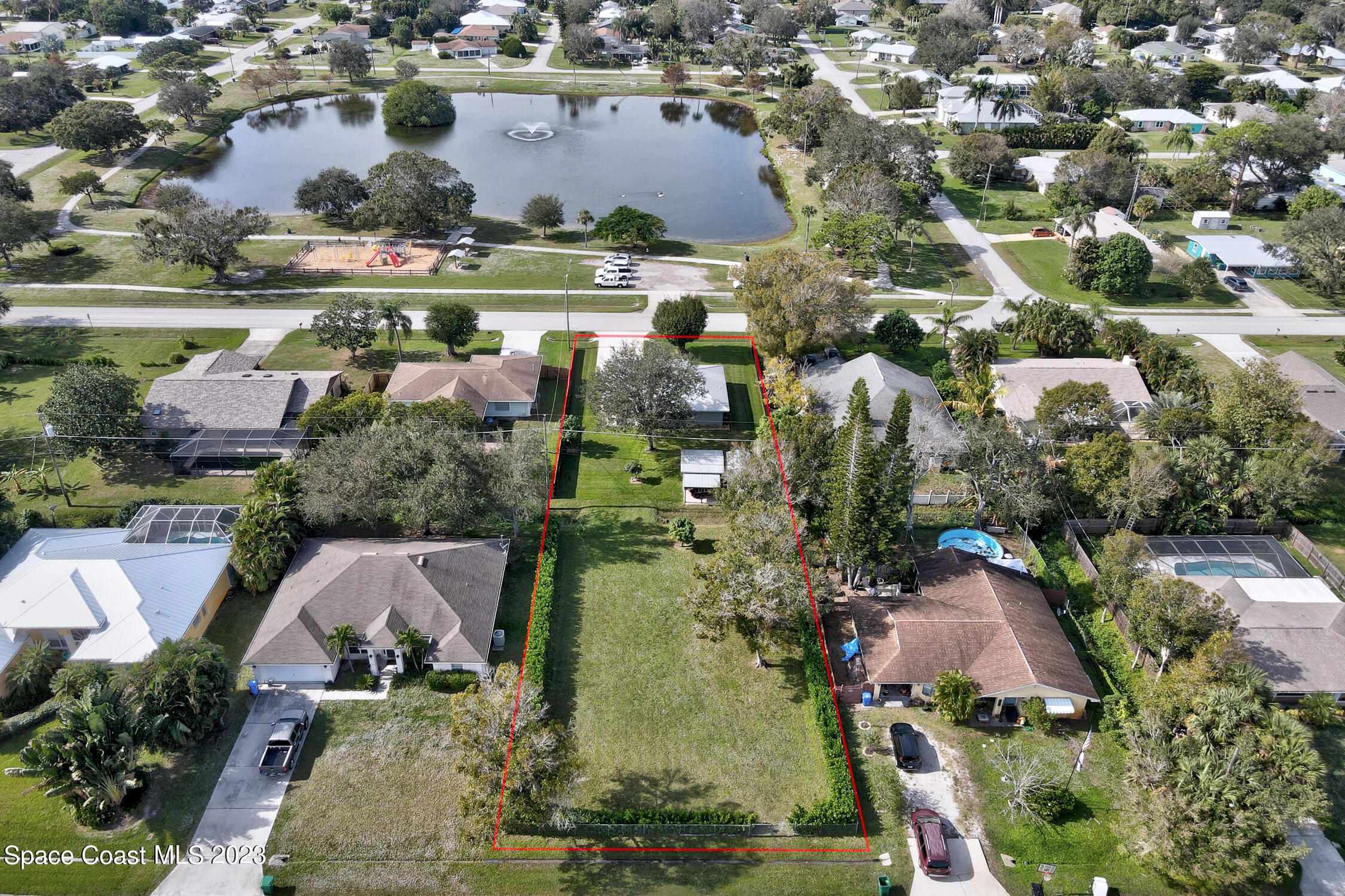461 Easy Street Sebastian, FL 32958 - Photo 26 of 31 an aerial view of residential houses with outdoor space and trees
