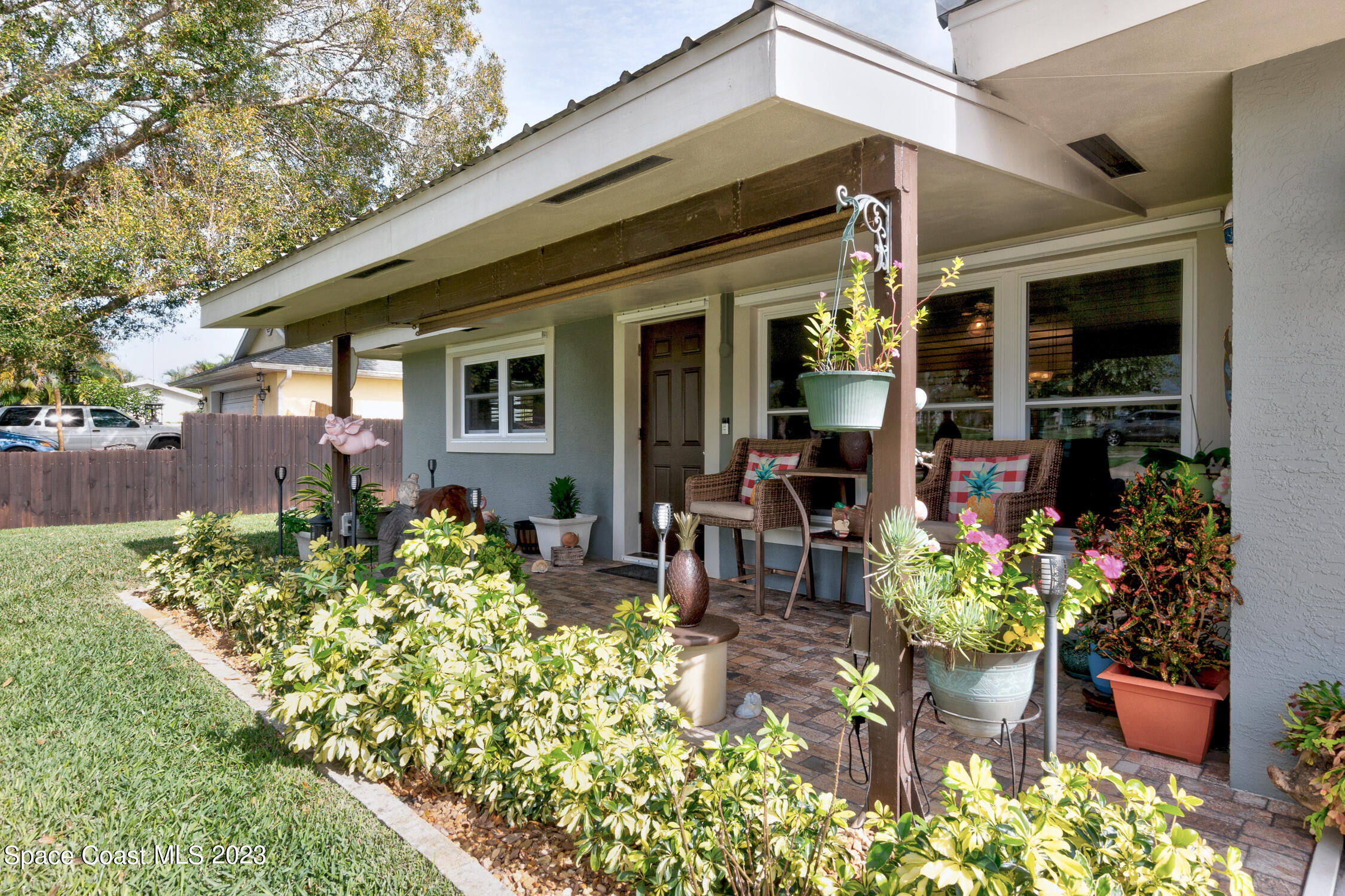 461 Easy Street Sebastian, FL 32958 - Photo 4 of 31 a front view of a house with a patio