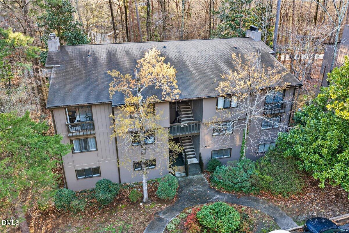 3088 Colony Road, Unit 3088D Durham, NC 27705 - Photo 2 of 25 a aerial view of a house with a yard and garden