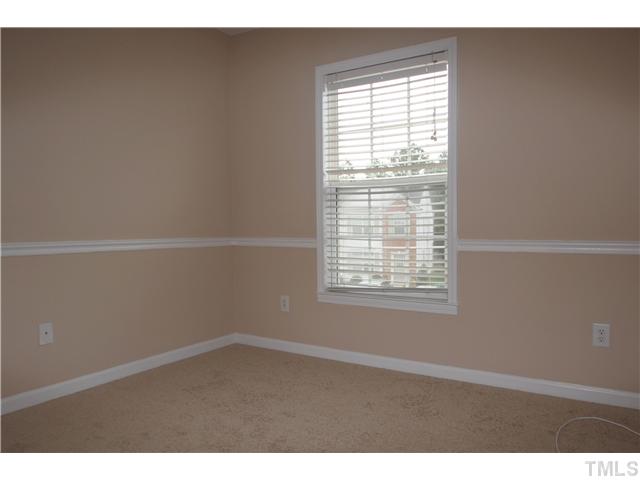 5308 Glen Canyon Road Raleigh, NC 27616 - Photo 12 of 12 a view of an empty room with a window