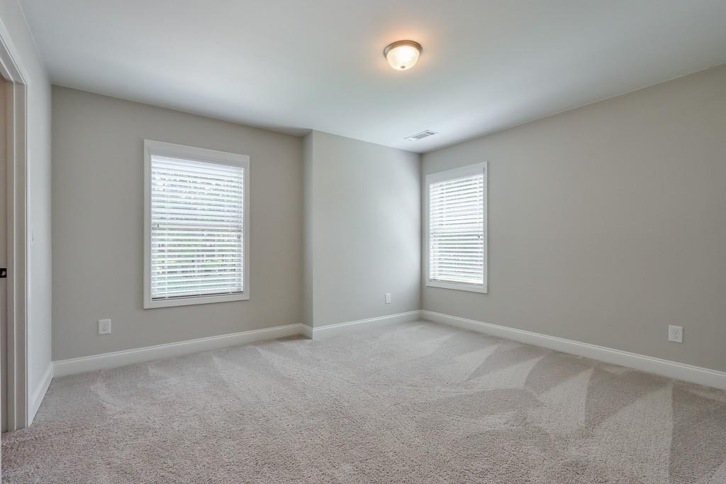 4688 Cantrell Road Flowery Branch, GA 30542 - Photo 26 of 39 a view of an empty room with a window