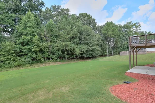 a view of a backyard with a garden