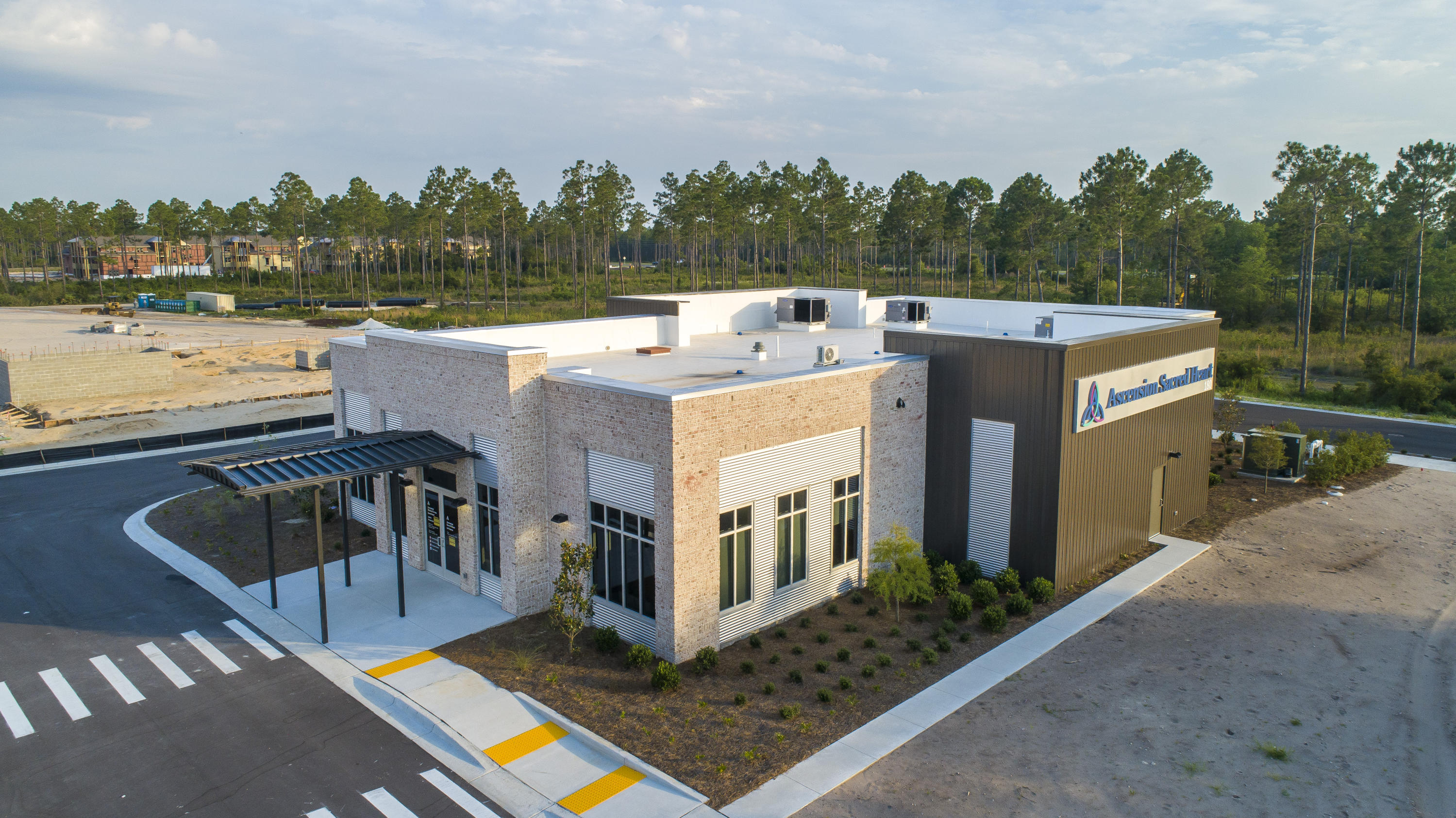 237 Suwanne Drive, Unit LOT 22 Watersound, FL 32461 - Photo 20 of 20 a view of a house with pool and sitting area