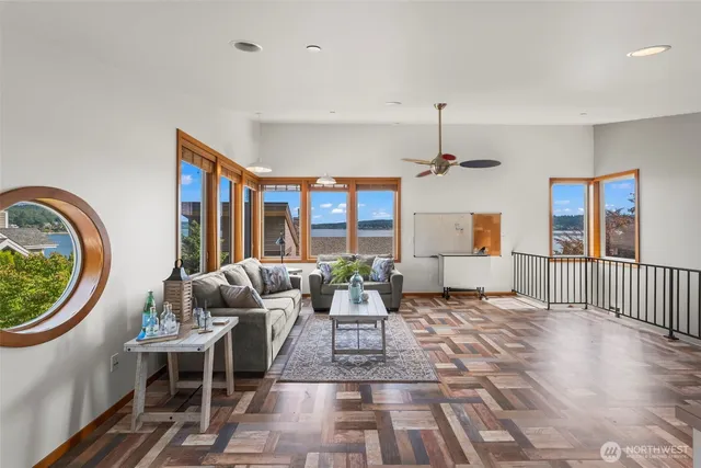 a bathroom with a sink mirror vanity and toilet