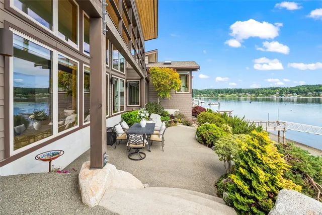 a view of a swimming pool with a lounge chairs